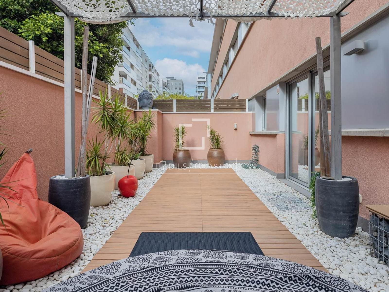 Renovated Three-Bedroom Apartment with Terraces in Sants-Badal